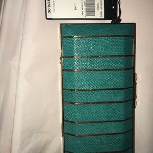 Turquoise & gold BCBG clutch bag